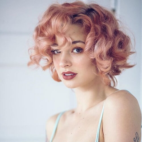 short hair with big rose gold curls