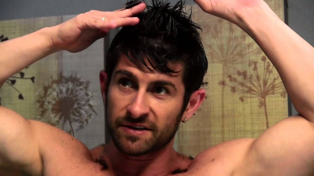 man cutting his hair