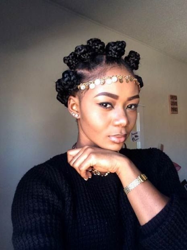 bantu knots with gold accessories 