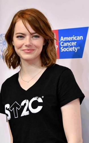 emma stone wearing a black shirt with a bed head