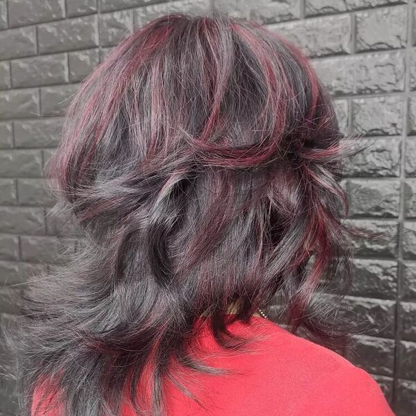 Red Highlights on Onyx Cut - a woman wearing a red shirt