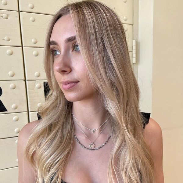 Blonde and Blended Long Hair - a woman wearing a sexy top.