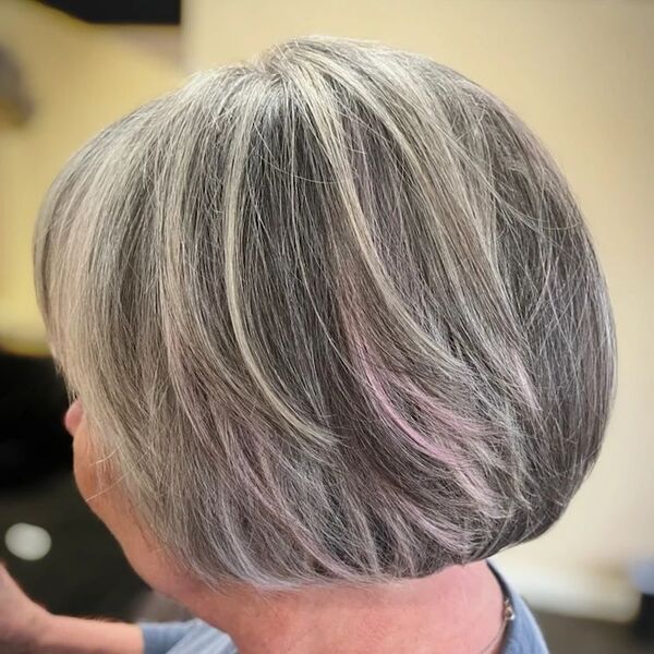 Gray Hair with Pink Tint - an old woman wearing a gray sweater