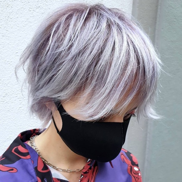 Shag Mullet in Purple Tint - a woman wearing a big chain silver necklace and a mask.