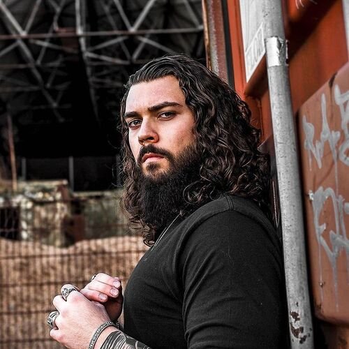 Long Thick Curly Hairstyles For Men