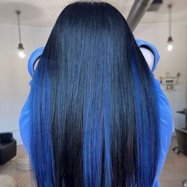 Vivid Blue-Black Hair - a woman wearing a thick blue jacket