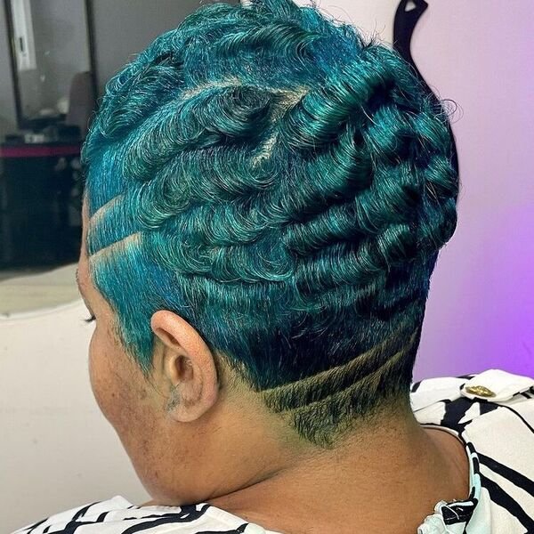 Blue Feathery Pixie with Designed Undercut - a woman wearing white black blouse.