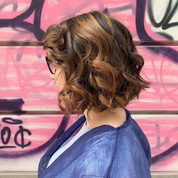 Dark Tone Curly Bob and Bangs - a woman wearing white shirt.