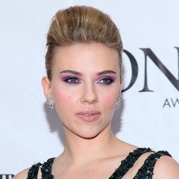 High Pompadour Bun - Scarlett Johansson is wearing fancy evening gown.