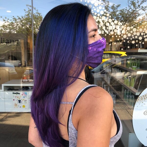 Layered Cosmic Ombre Hairstyle - a woman wearing cosmic mask in gray sexy top.