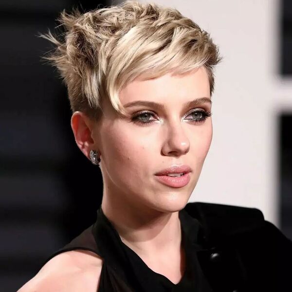 Messy Fringe Undercut - Scarlett Johansson is wearing black dress with earrings.