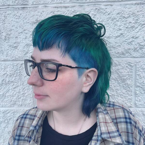 Refreshed Mullet Hair - A woman wearing glasses