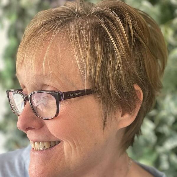 Short Universal Pixie with Blonde - A woman wearing eyeglasses