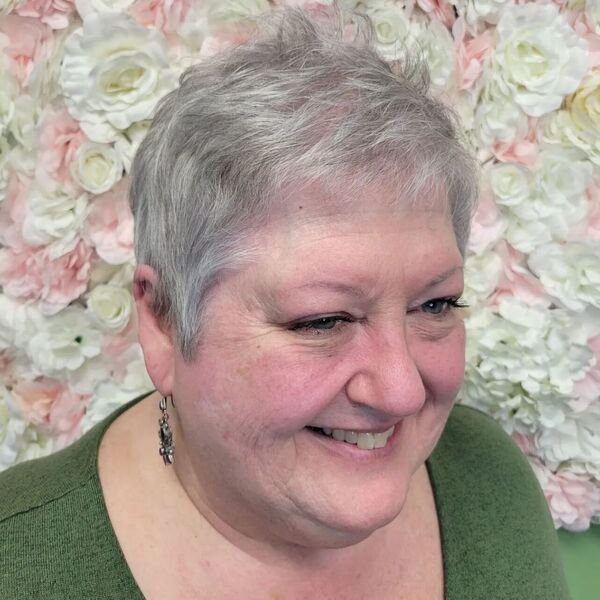 Silvery Gray Fine Pixie - a woman wearing green shirt.