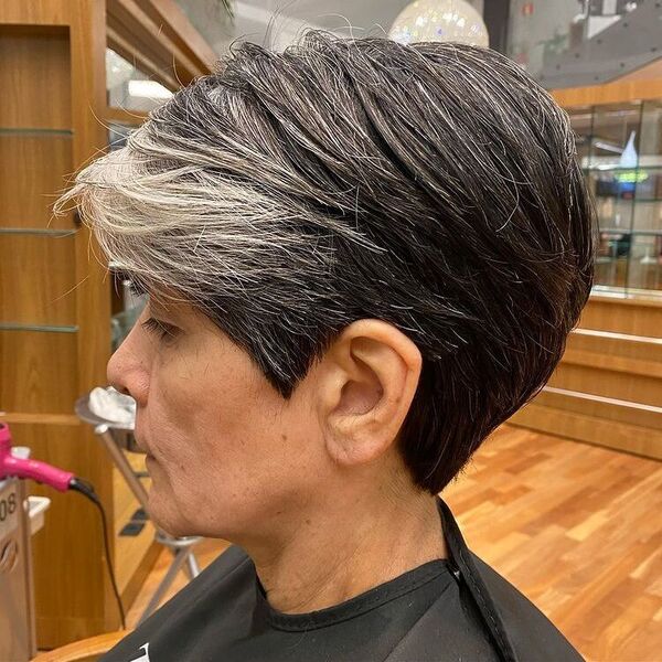 Textured Pixie Cut with Black and White Hair - A woman inside a salon