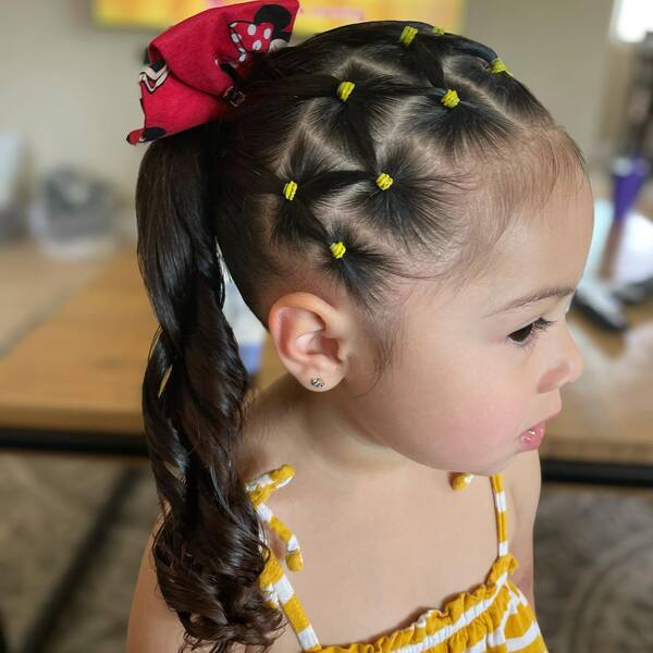Zigzag Box Rubber Band Hairstyles for Girls - a girl wearing smocked sexy yellow top.