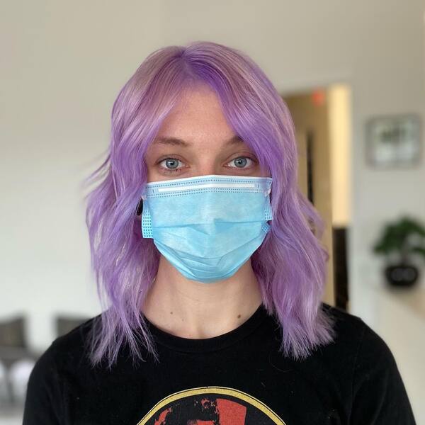 Full Head Hair - a woman wearing a surgical facemask