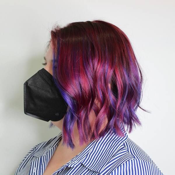 Metallic Pink Purple Hair - a woman wearing a black KN95 facemask