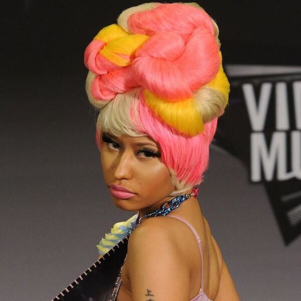 Nicki Minaj Hairstyle - a woman wearing a sexy costume