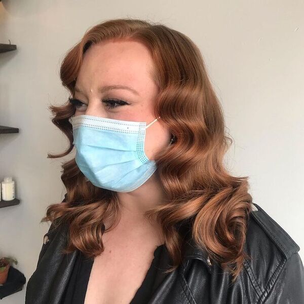 Shoulder Length Finger Waves - a woman wearing a surgical facemask