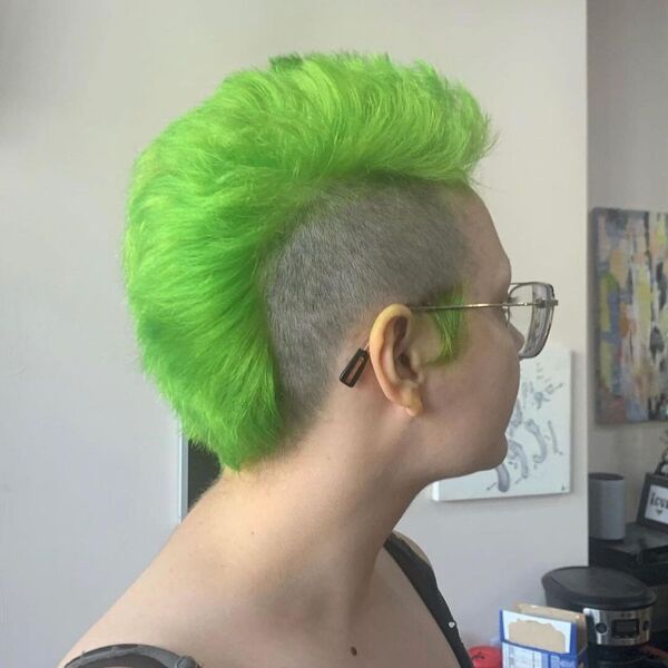 Snazzy Green Mohawk - a woman wearing a eyeglasses