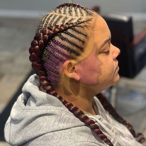 Two-Toned Fishbone Braids - a woman wearing a gray hooded jacket