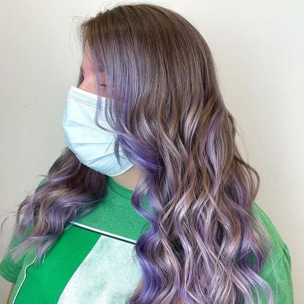 Two Toned Pastel Purple Hair - a woman wearing a surgical facemask