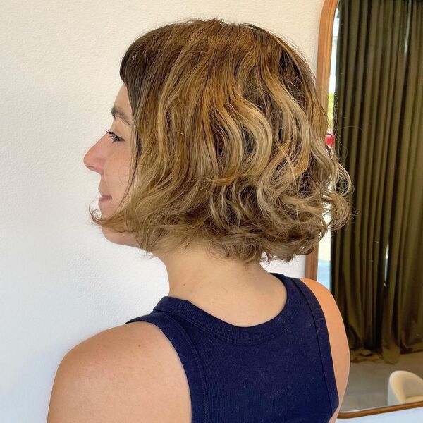 Blonde Haircut with Curls