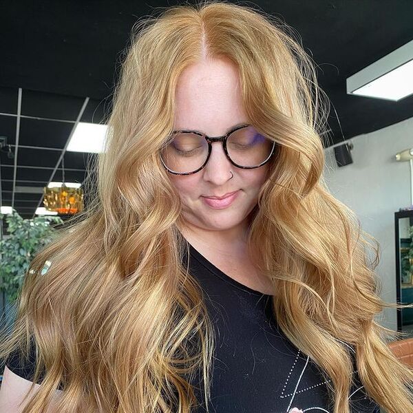 honey blonde hair - a woman wearing a eyeglasses