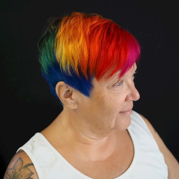 Short and Sassy Haircut - a woman with tattoo wearing a white sleeveless shirt