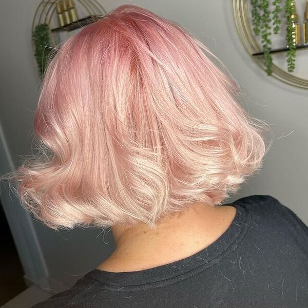 pink ombre hair - a woman wearing black shirt