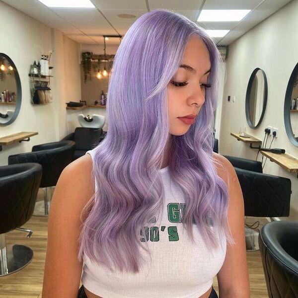 lilac hair - a woman wearing a white croptop