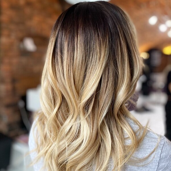 blonde ombre - a woman wearing a gray shirt