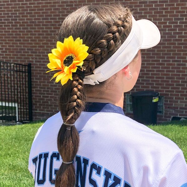 Sporty Hairstyle - a woman wearing a jersey