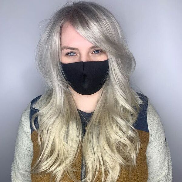 long shag - a woman wearing a black facemask