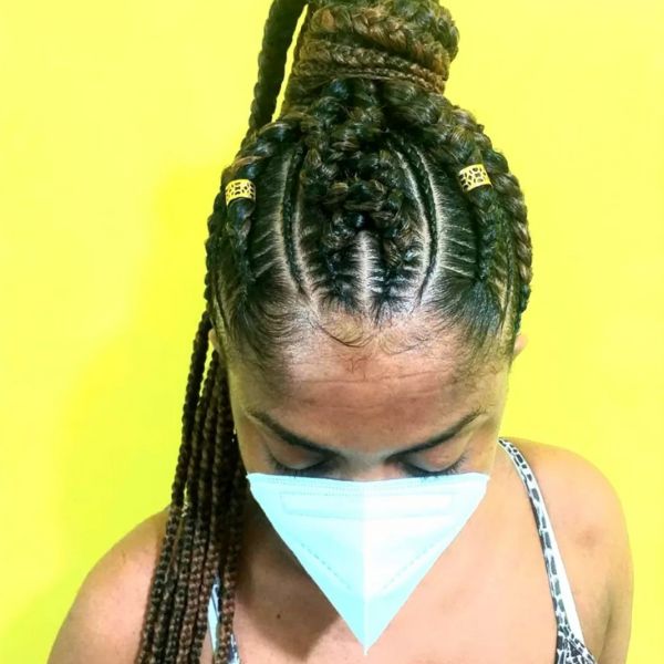 Ponytail Braided Updo - woman wearing a white face mask and wearing a stripe sleeveless top