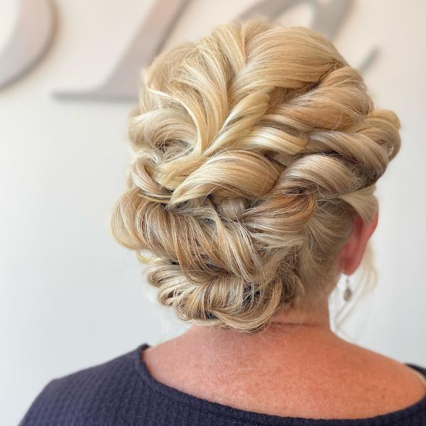 Mother of the Bride Hairstyles - a woman wearing a black shirt