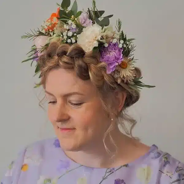 a woman wearing a floral blouse