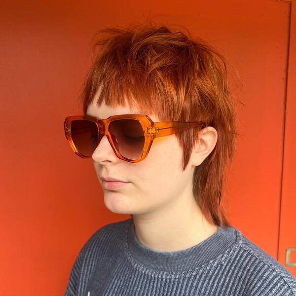 a woman wearing a sunglasses