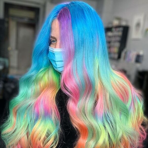Pastel Glow Hair - a woman wearing a surgical facemask