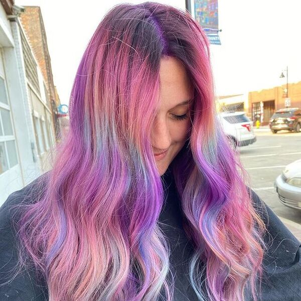Pastel Rainbow Hairstyle - a woman wearing a black cape