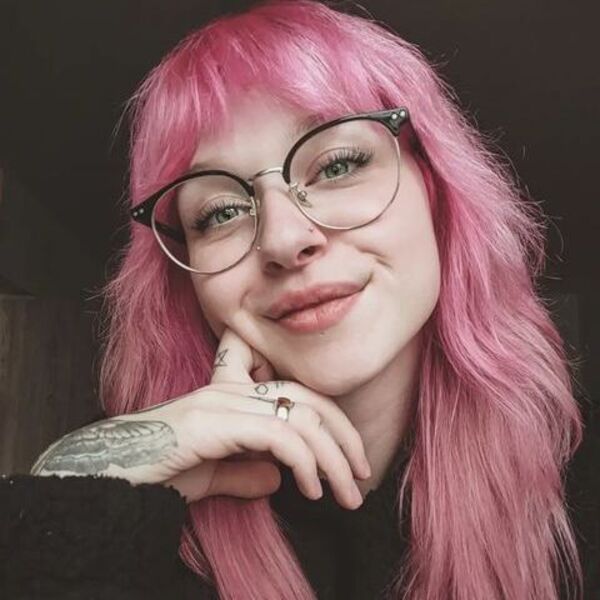 Pink Hair on Shaggy Haircuts- a girl wearing glasses and has nose piercing