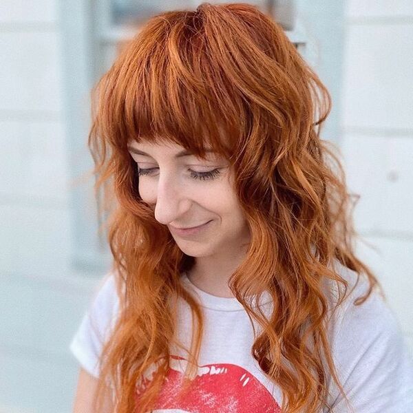 Redhead Shaggy Haircuts- a girl wearing white shirt