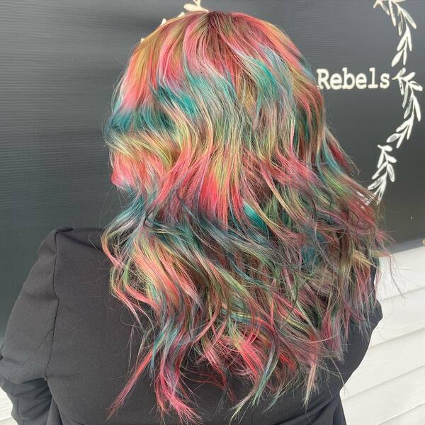 Vivid Holographic Hair - a woman wearing a black office blazer