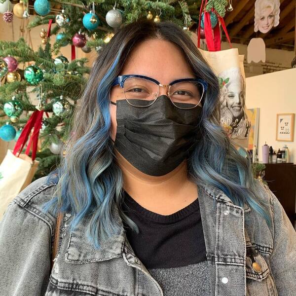 Icy Light Blue Ombre Balayage - a woman wearing a eyeglasses and black facemask