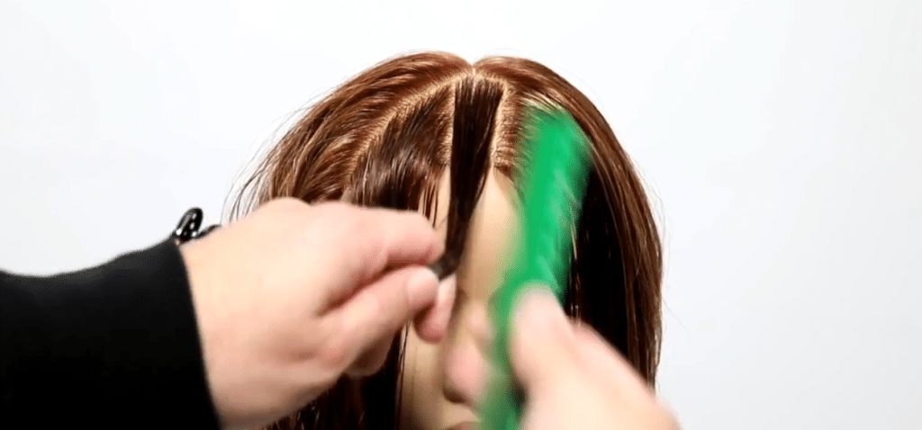 Untie The Top Hairs And Create A Center Section